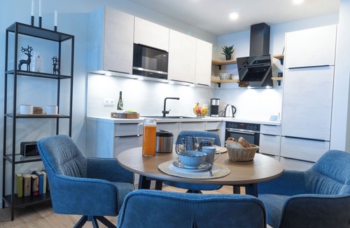 Dorumer Neufeld Apartment | Modern Apartment with Balcony & Sauna Near the Beach