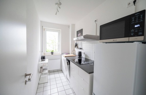 Asemissen Apartment | Moderne Ferienwohnung mit Terrasse am Teutoburger Wald. Haustierfreundlich!
