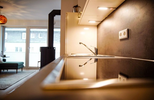 Langewiese Apartment | Modern City-Center Apartment with Balcony & Relaxation Amenities