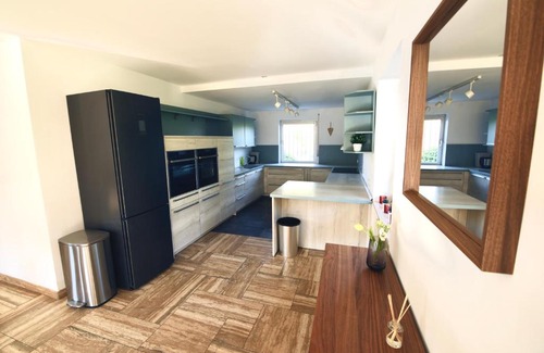 Hochwaldhausen Apartment | Inviting Family Retreat in Nature Park with Ocean Views