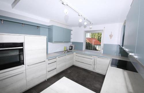 Hochwaldhausen Apartment | Inviting Family Retreat in Nature Park with Ocean Views
