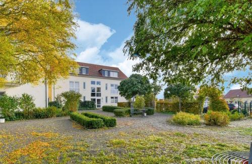 Wiek Apartment | Cozy Apartment with Terrace Steps from the Sea