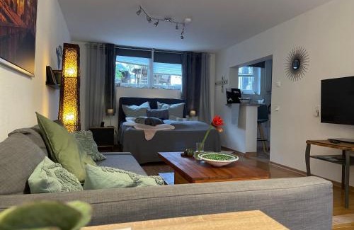 Volkhoven/Weiler Apartment | Tranquil Green Retreat: Modern Apartment for Families