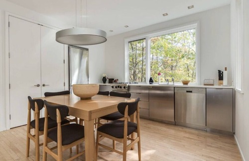 Water Mill House | Modern Treehouse Retreat with Private Tennis & Nature Access