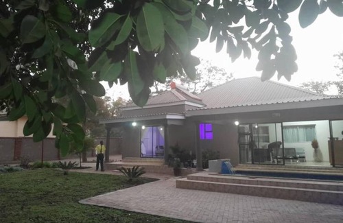 Kadoma Apartment | Modern Standard Room with Queen Bed & Breakfast Included