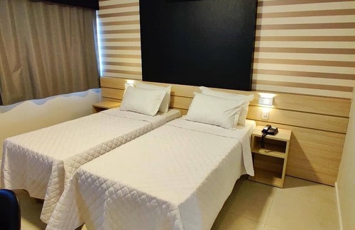 Palmital Hotel | Discover Mogano Express Hotel: Top-Rated & Family-Friendly