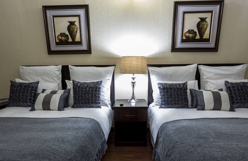 Chingola Hotel | Discover Mokorro Hotel: Family-Friendly with Pool & Restaurant