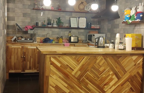 Mokpo House | Elegant Mokpo White Windmill Guesthouse with Family Amenities