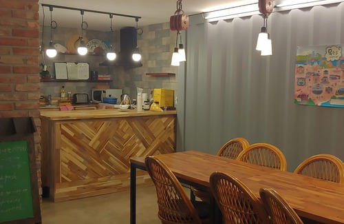 Mokpo House | Elegant Mokpo White Windmill Guesthouse with Family Amenities