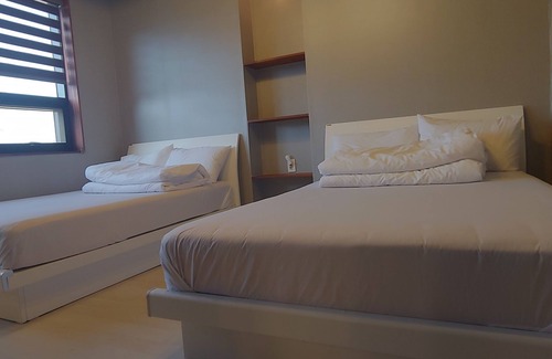Mokpo House | Elegant Mokpo White Windmill Guesthouse with Family Amenities