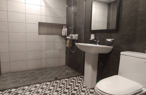 Mokpo House | Elegant Mokpo White Windmill Guesthouse with Family Amenities