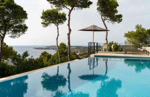Sant Josep de sa Talaia Villa | Relax at Molí: Oceanfront Haven with Pool and Fireplace