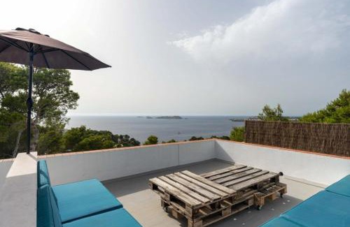Sant Josep de sa Talaia Villa | Relax at Molí: Oceanfront Haven with Pool and Fireplace
