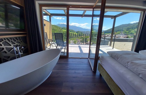 Muhlbach Hotel | Discover Molaris Lodge: Family-Friendly Retreat with Spa