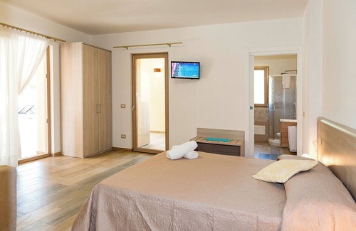 San Teodoro House | Cozy Molarotto Rooms with Kitchenette and Pool Access