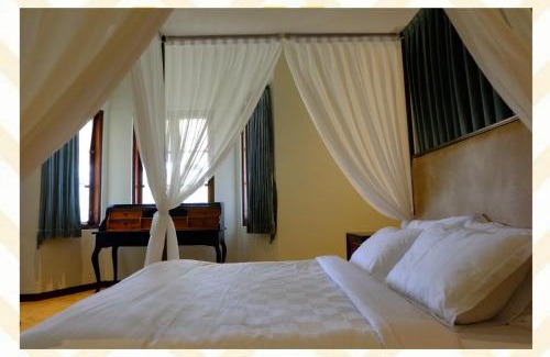 Dinoyo House | Discover Mom's Corner: Family-Friendly Getaway with Pool