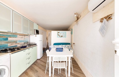 San Pietro in Bevagna Apartment | Experience Comfort at 2184 Mono Chicca Blu with Ocean Views