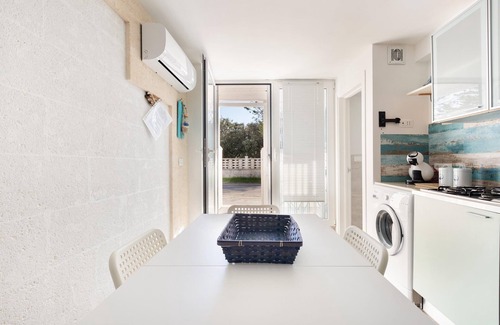 San Pietro in Bevagna Apartment | Experience Comfort at 2184 Mono Chicca Blu with Ocean Views