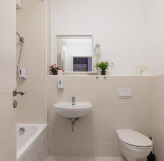 Corvin negyed Apartment | Explore Prince Downtown Apartments with Free Parking