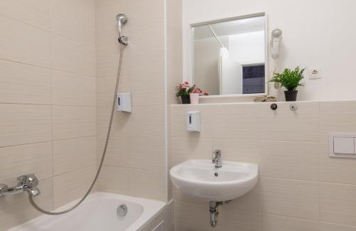 Corvin negyed Apartment | Explore Prince Downtown Apartments with Free Parking