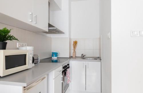 Corvin negyed Apartment | Explore Prince Downtown Apartments with Free Parking