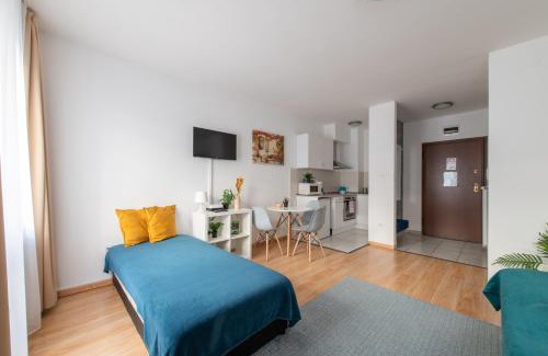 Corvin negyed Apartment | Explore Prince Downtown Apartments with Free Parking