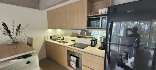 Olivos Apartment | Cozy River View Studio with Pool and Oceanfront Access