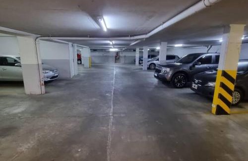 Belgrano Apartment | Monroe Suites: Poolside Retreat with Garage Access