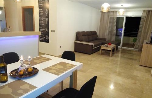 Ador Apartment | Monte Corona: Oceanfront Retreat with Pool & Pet-Friendly Stays