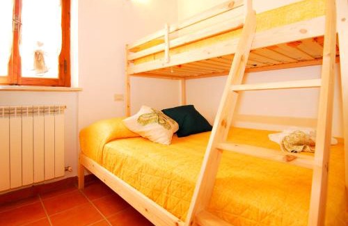 Montelaguardia Apartment | Monte Malbe Villa: Family-Friendly Stay with Garden Access
