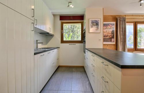 Champery Apartment | Modern Retreat Steps from Cable Car with Family-Friendly Perks
