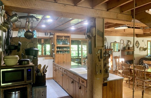 Niles House | Idyllic Waterfront Retreat Near Notre Dame with Pool & Spa