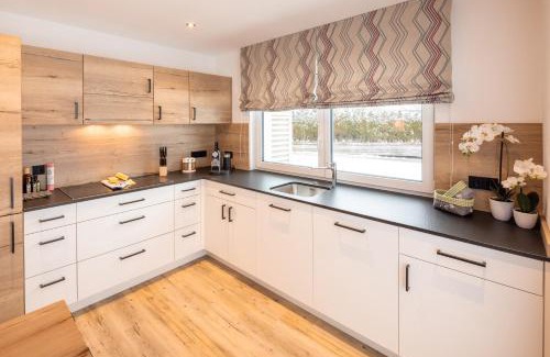 Heitlern Apartment | Elegant Monusse Boid Wohnung 13: Family-Friendly Retreat