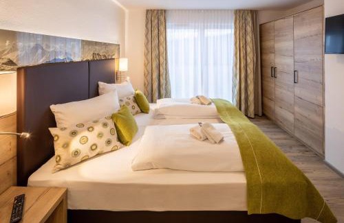 Heitlern Apartment | Elegant Monusse Boid Wohnung 13: Family-Friendly Retreat