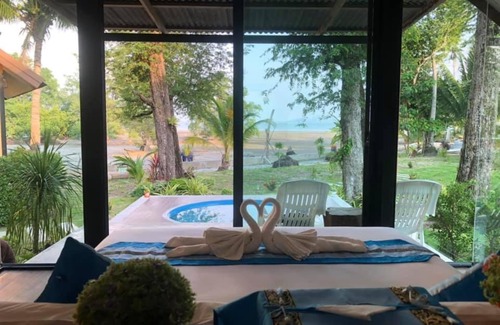 Ko Mook Resort | Beachfront Bliss at Mook Tamarind Resort: Family Fun Awaits