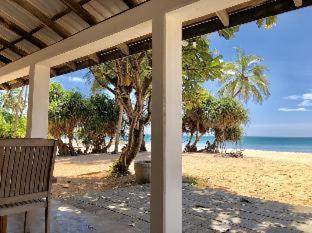 Nilaveli House | Beachfront Oasis: Moon Isle Beach Bungalow with Ocean View