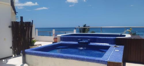 Puerto Morelos Apartment | Discover Moonroof2: Relax by the Pool in Comfort