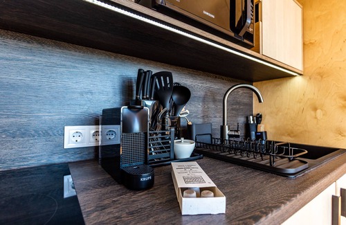 Hosszuheteny Ski Chalet | Moose Cabin: Panoramic Views and Family-Friendly Amenities