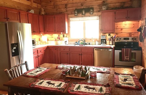 Rising Fawn Cabin | Relaxing Moose Tracks Lodge with Hot Tub on Johnson Lake
