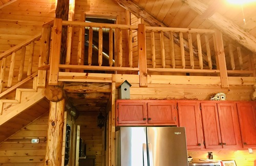 Rising Fawn Cabin | Relaxing Moose Tracks Lodge with Hot Tub on Johnson Lake