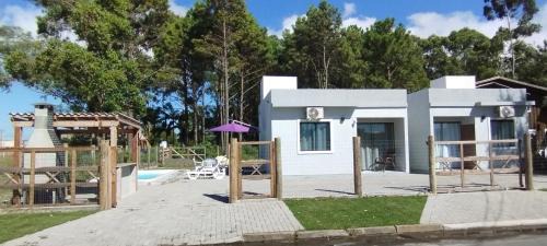 Capao da Canoa House | Serene Morada do Bosque: Ocean View & Private Beach Retreat