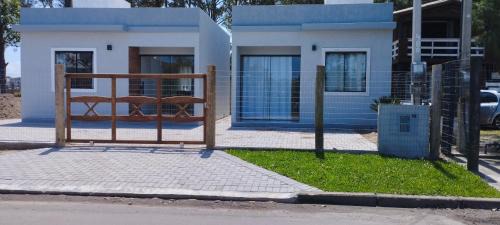 Capao da Canoa House | Serene Morada do Bosque: Ocean View & Private Beach Retreat
