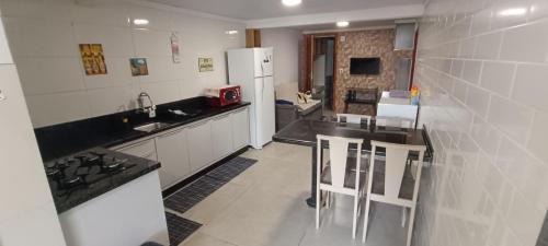 Carianos Apartment | Convenient Moradas Desterro Near Airport, Pet & Child Friendly