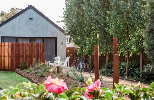 Flinders Apartment | Morradoo Studio - Unwind by the cozy fireplace with firewood.
