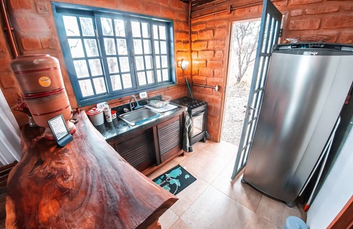Alto Paraiso de Goias Ski Chalet | Discover Comfort at Morro da Luz: Spa & Family-Friendly
