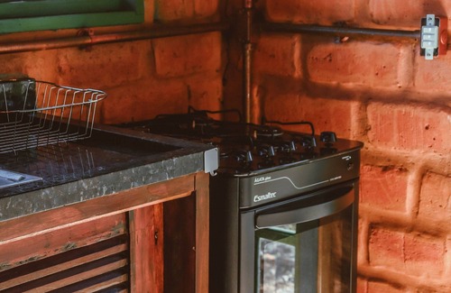 Alto Paraiso de Goias Ski Chalet | Discover Comfort at Morro da Luz: Spa & Family-Friendly