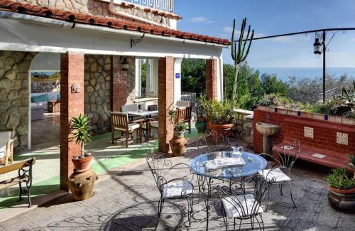 Marina del Cantone Apartment | Oceanfront Escape at Morso di Luna - Rated 9/10 by Guests