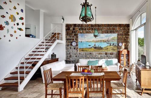 Marina del Cantone Apartment | Oceanfront Escape at Morso di Luna - Rated 9/10 by Guests