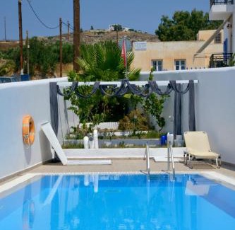 Adamas Apartment | Relax at Moschoula Studios: Pool, Spa & Child-Friendly Fun