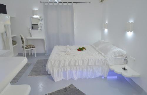 Adamas Apartment | Relax at Moschoula Studios: Pool, Spa & Child-Friendly Fun